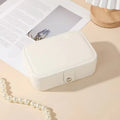 Elegant Jewelry Organizer Compact Travel Case for Earrings Rings Necklace Double Layer Storage
