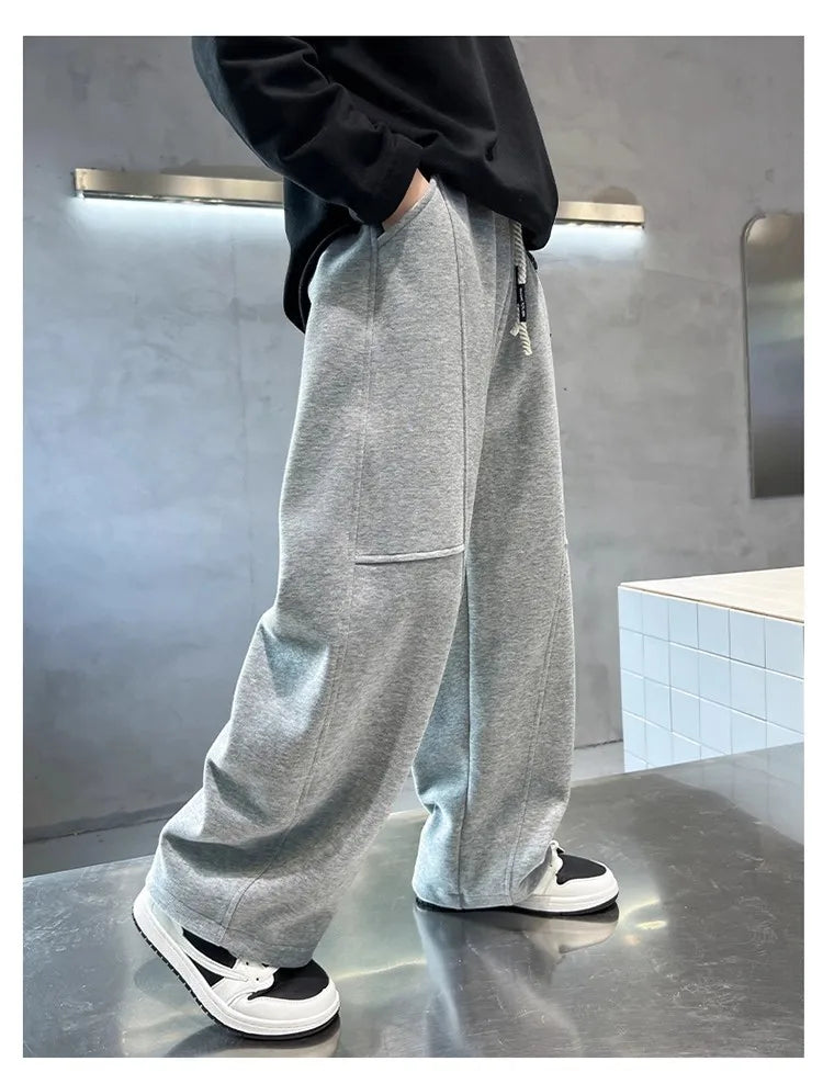 2026 New Spring Casual Kids Pants Black Elastic Waist Straight Leg Sweatpants for Boys Loose Pocket Children Trousers