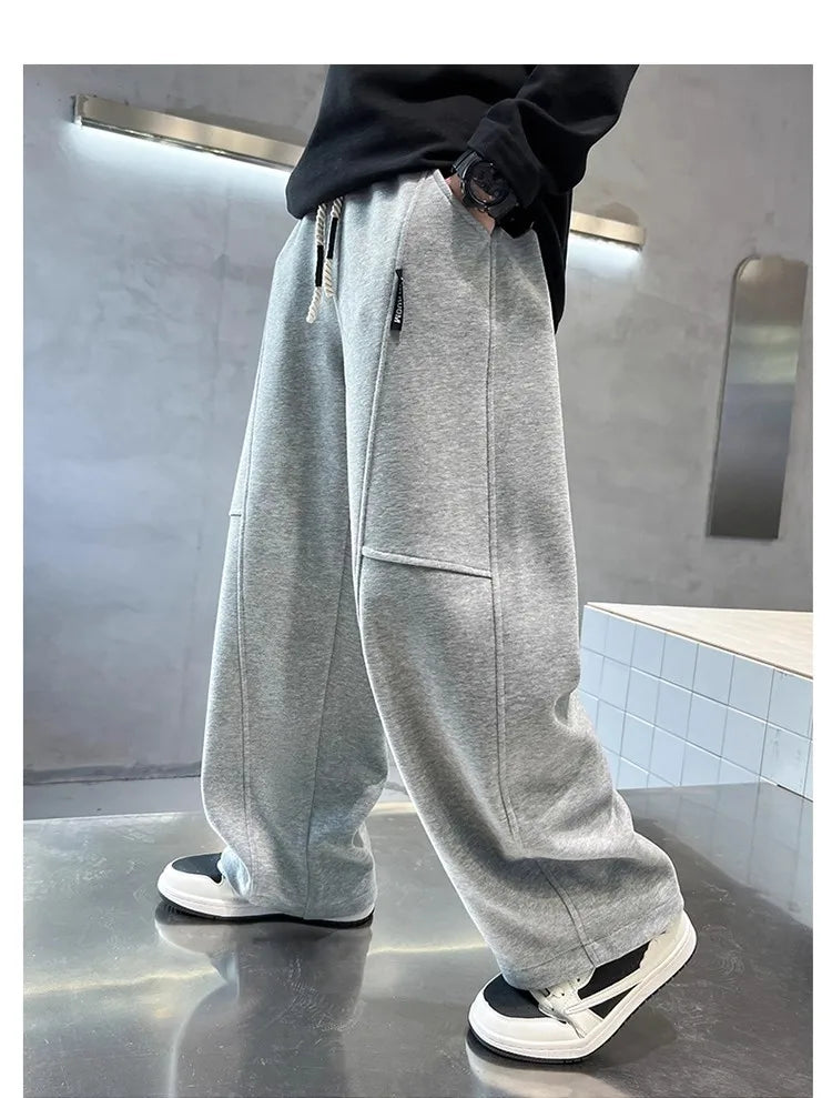 2026 New Spring Casual Kids Pants Black Elastic Waist Straight Leg Sweatpants for Boys Loose Pocket Children Trousers