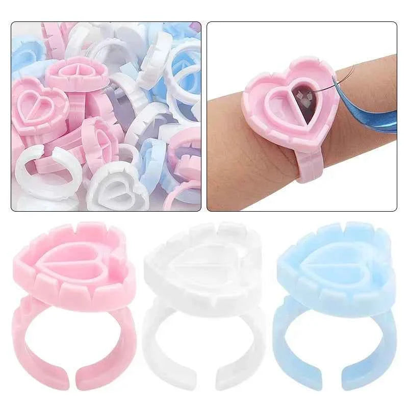 100 PCS Disposable Heart-shaped Plastic Glue Ring Cup Eyelash Extension Tattoo Pigment Holder Pallet Lash Makeup Supplies Tools