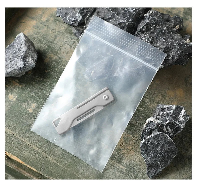 Titanium alloy outdoor utility knife mini folding knife portable pocket knife for express delivery box opening tool