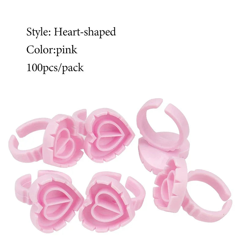 100 PCS Disposable Heart-shaped Plastic Glue Ring Cup Eyelash Extension Tattoo Pigment Holder Pallet Lash Makeup Supplies Tools