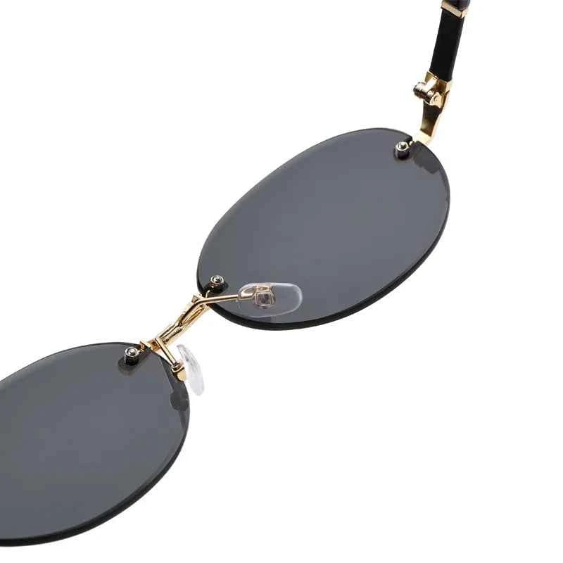 Popular Women Men Shades Oval Sun Glasses for Female Male Summer Traveling UV400 Rimless Sunglasses Round Fashion Gafas De Sol
