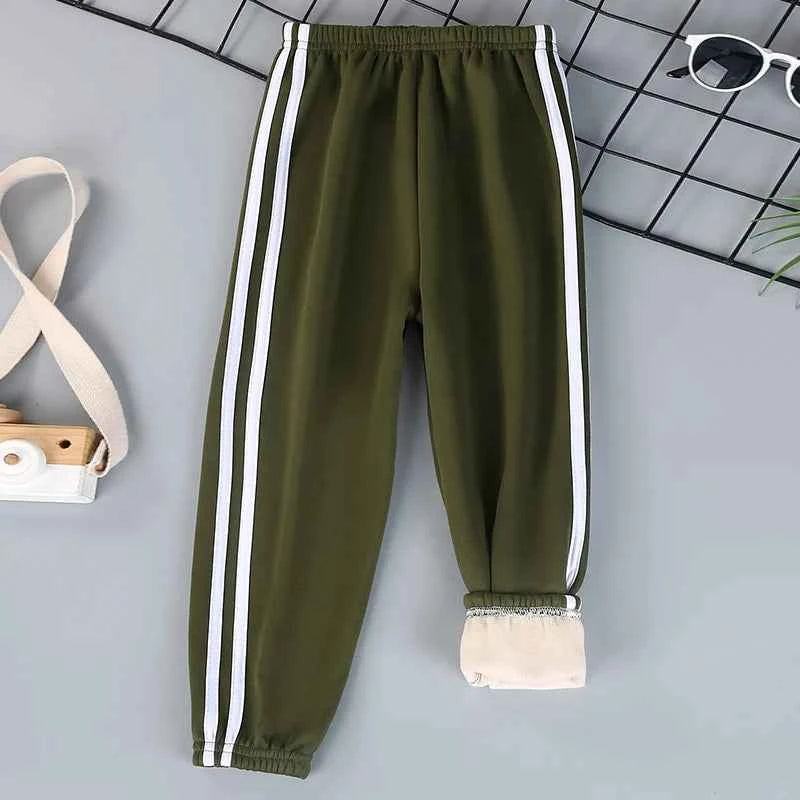 Autumn and winter children's solid color sports plus velvet pants boys and girls comfortable leisure warm sports fashion pants.