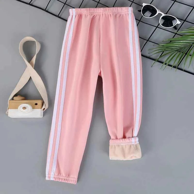 Autumn and winter children's solid color sports plus velvet pants boys and girls comfortable leisure warm sports fashion pants.