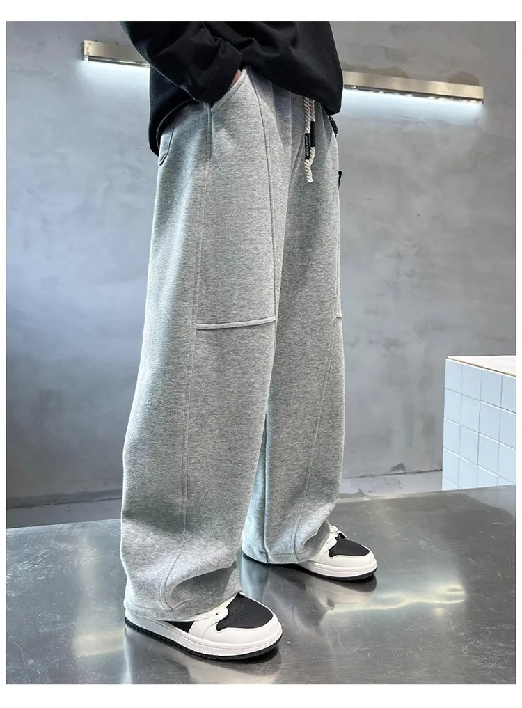 2026 New Spring Casual Kids Pants Black Elastic Waist Straight Leg Sweatpants for Boys Loose Pocket Children Trousers