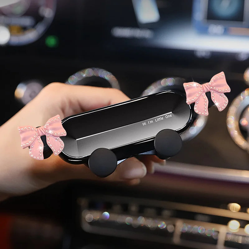 Cute Bowknot Universal Car Phone Holder Cartoon Diamond GPS Stand Gravity Bracket Auto Air Vent Clip Mount Mobile Phone Holder